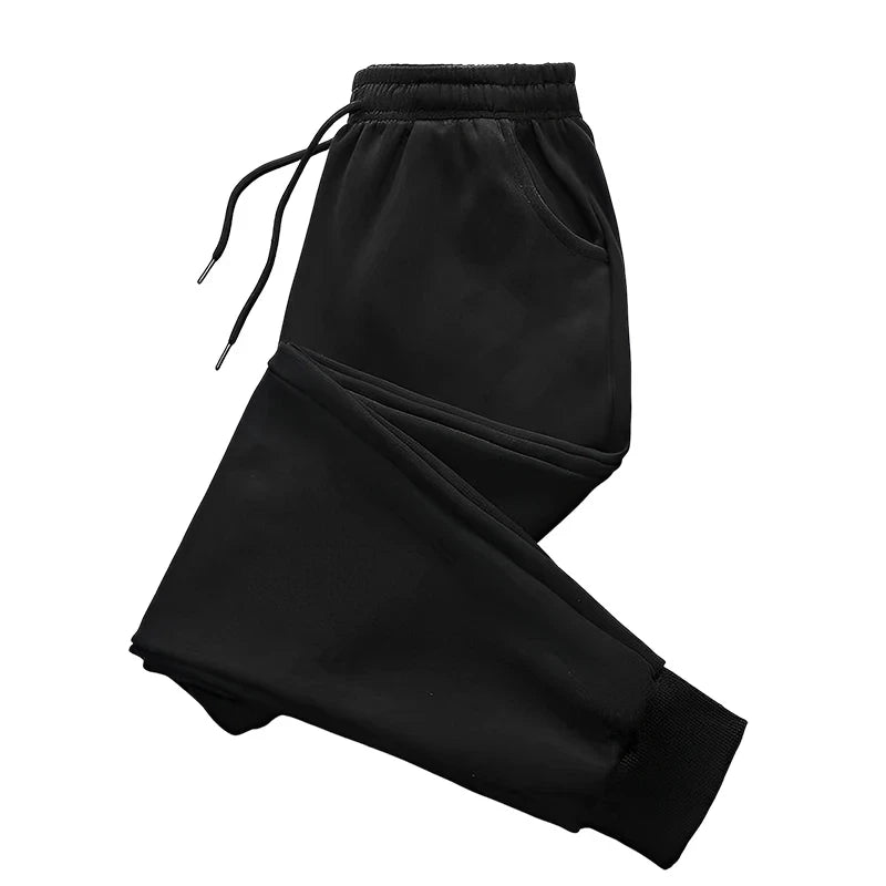 Pantalon long unisexe sans imprimé pour femme, pantalon de survêtement ample et décontracté pour le jogging et les activités de plein air, avec cordon de serrage, idéal au quotidien.