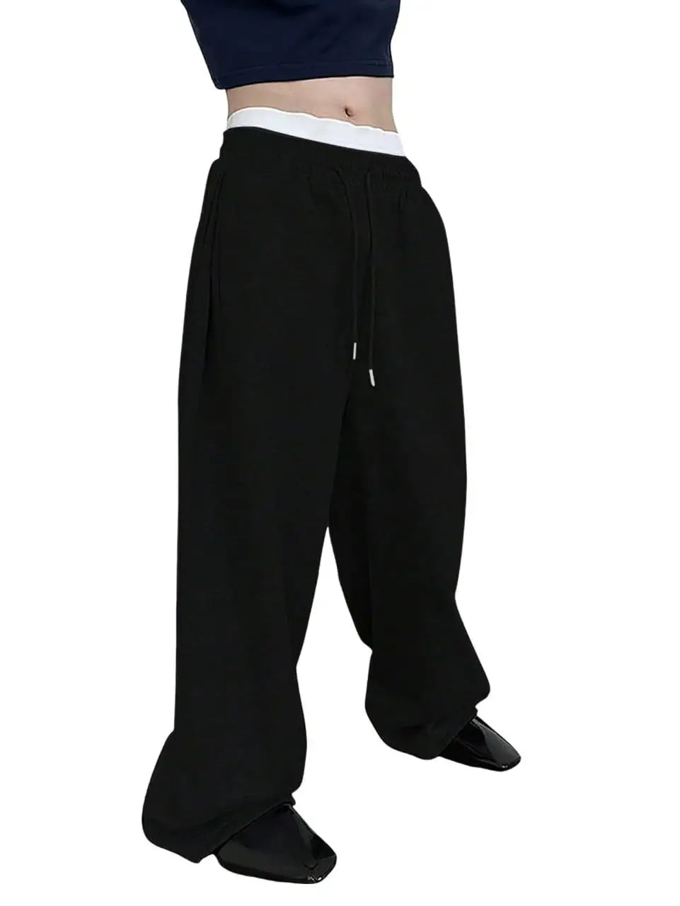 Pantalon de jogging pour homme, coupe droite, idéal pour le sport et la mode urbaine. Pantalon ample et décontracté avec cordon de serrage et plusieurs poches.