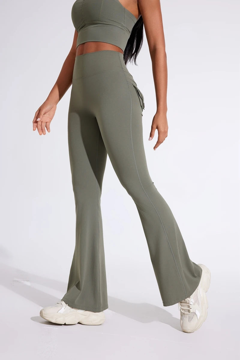 Pantalon de yoga taille haute à poches pour femme DIAS FIT JOY, effet push-up, séchage rapide, idéal pour la course, le sport et la salle de gym.
