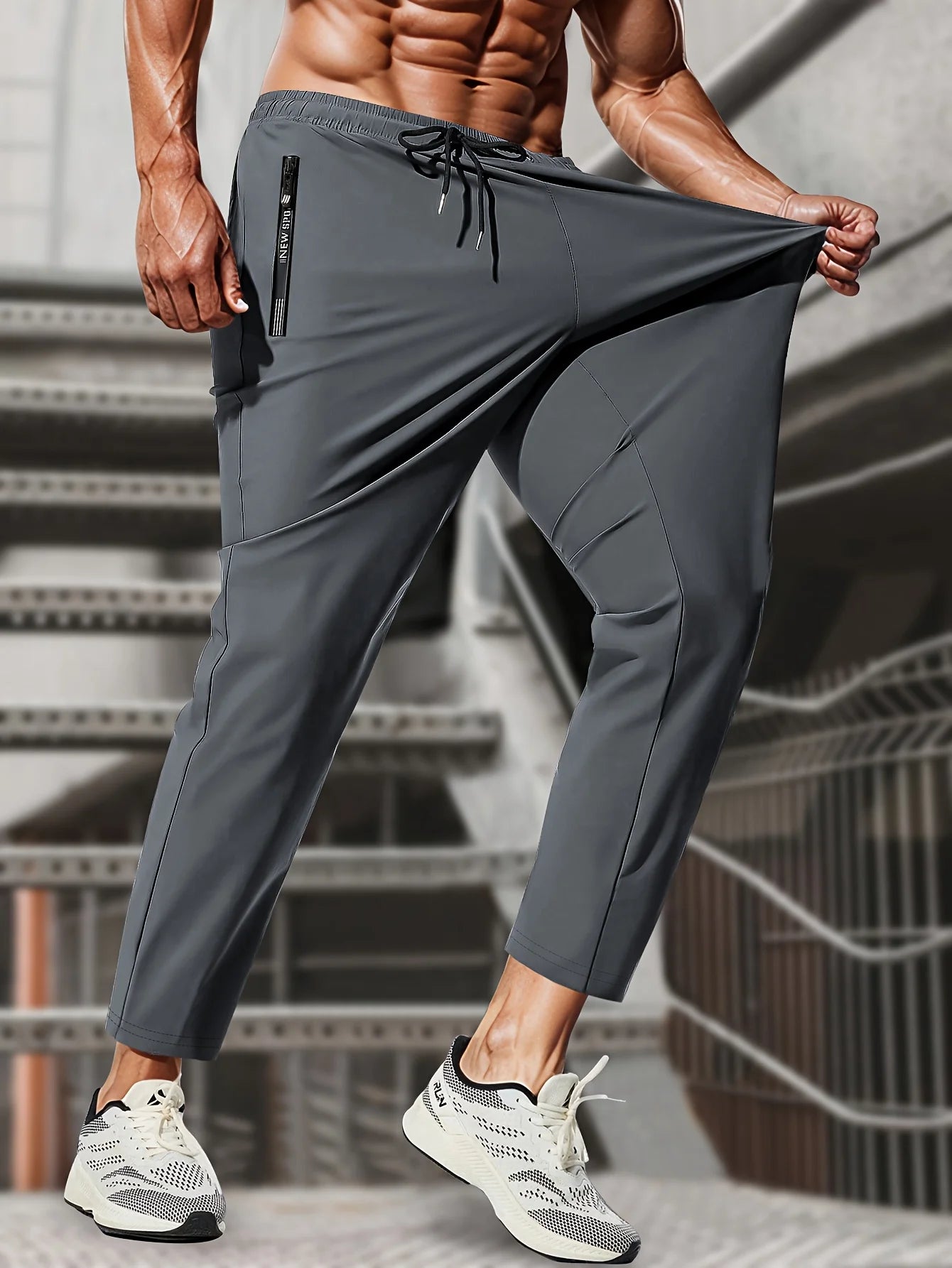 Pantalon de jogging homme, idéal pour la pêche. Modèle en soie glacée extensible avec poches zippées. Pantalon de sport respirant et élastique. Idée cadeau pour homme.