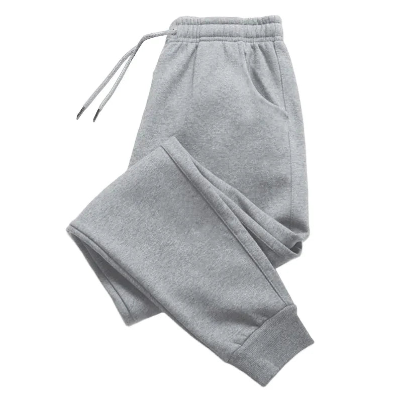 Pantalon long unisexe sans imprimé pour femme, pantalon de survêtement ample et décontracté pour le jogging et les activités de plein air, avec cordon de serrage, idéal au quotidien.