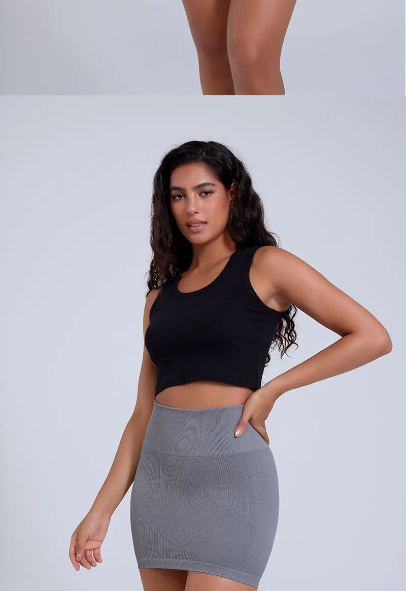 FINETOO Printemps Été Nouvelle Jupe Mini Taille Haute Élastique Noire Affinante en Tricot Court pour Femmes Professionnelles