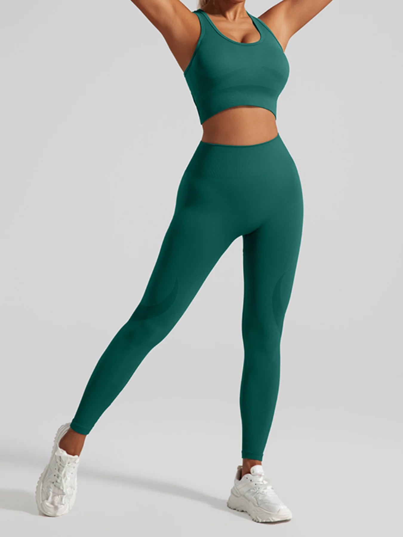 Ensemble de sport sans coutures pour femme : pantalon de yoga taille haute et brassière de sport avec coussinets amovibles pour un effet push-up fessier, idéal pour la course et l'entraînement.