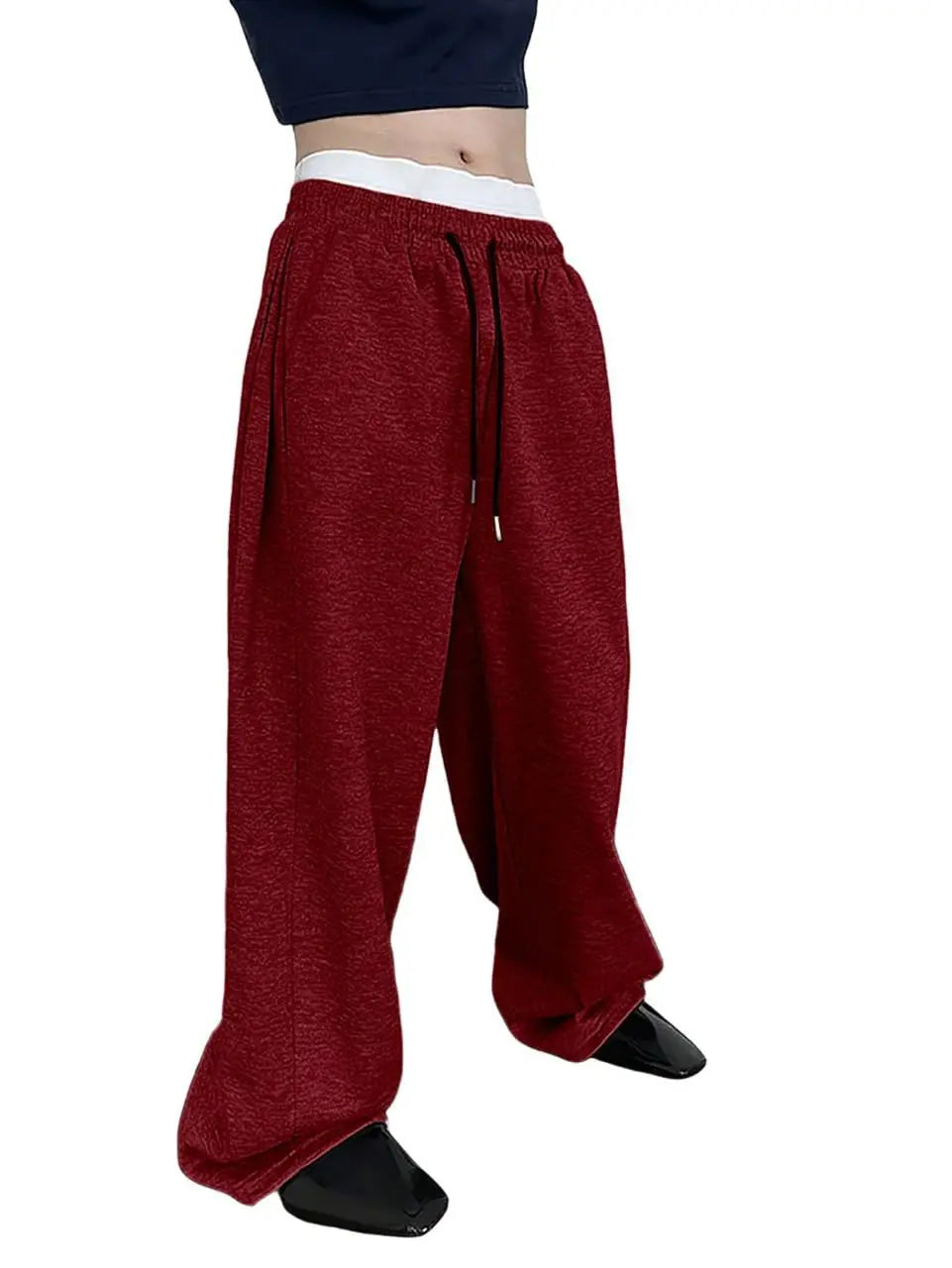 Pantalon de jogging pour homme, coupe droite, idéal pour le sport et la mode urbaine. Pantalon ample et décontracté avec cordon de serrage et plusieurs poches.