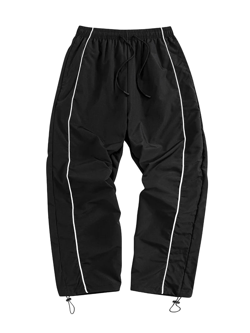 Pantalon de sport tendance pour homme, avec lignes, idéal pour la salle de sport et la course à pied. Poches latérales, séchage rapide et respirant.