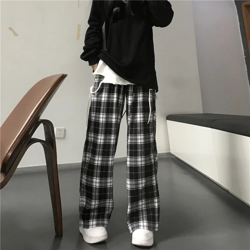 Pantalon de survêtement oversize pour femme, style tendance, à carreaux noirs, coupe ample, taille élastique, poches, style hip-hop unisexe, coupe ample.