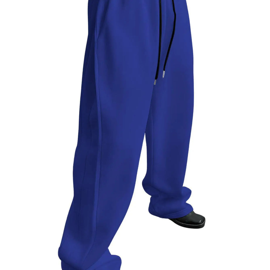 Pantalon de jogging pour homme, coupe droite, idéal pour le sport et la mode urbaine. Pantalon ample et décontracté avec cordon de serrage et plusieurs poches.