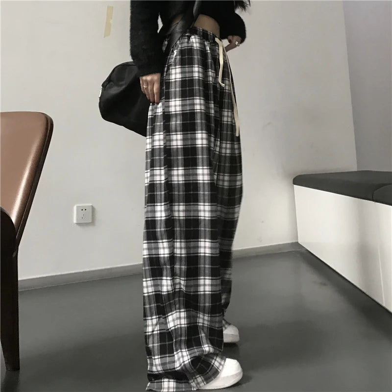 Pantalon de survêtement oversize pour femme, style tendance, à carreaux noirs, coupe ample, taille élastique, poches, style hip-hop unisexe, coupe ample.