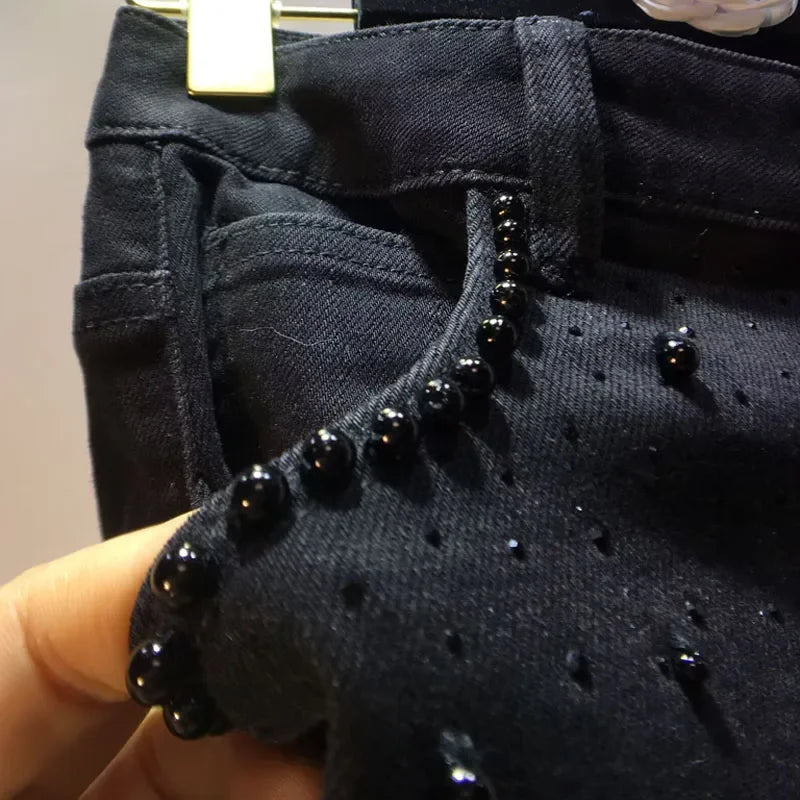 Jean en dentelle ajourée européenne 2025 pour femme, été, nouveau pantalon en denim noir à dentelle, perles industrielles lourdes, empiècements en denim à motif diamant, crochet