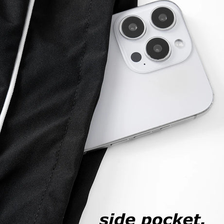 Pantalon de sport tendance pour homme, avec lignes, idéal pour la salle de sport et la course à pied. Poches latérales, séchage rapide et respirant.
