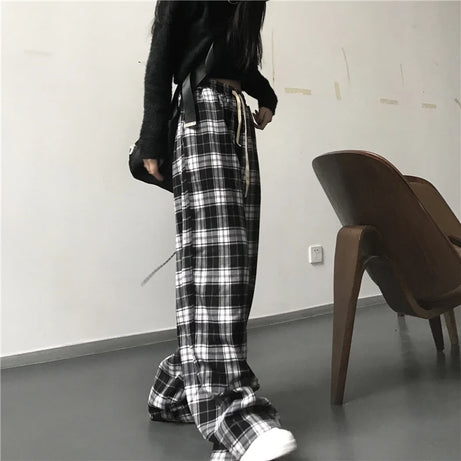 Pantalon de survêtement oversize pour femme, style tendance, à carreaux noirs, coupe ample, taille élastique, poches, style hip-hop unisexe, coupe ample.