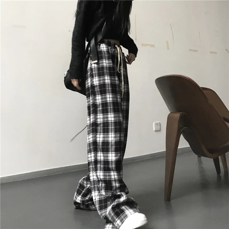 Pantalon de survêtement oversize pour femme, style tendance, à carreaux noirs, coupe ample, taille élastique, poches, style hip-hop unisexe, coupe ample.