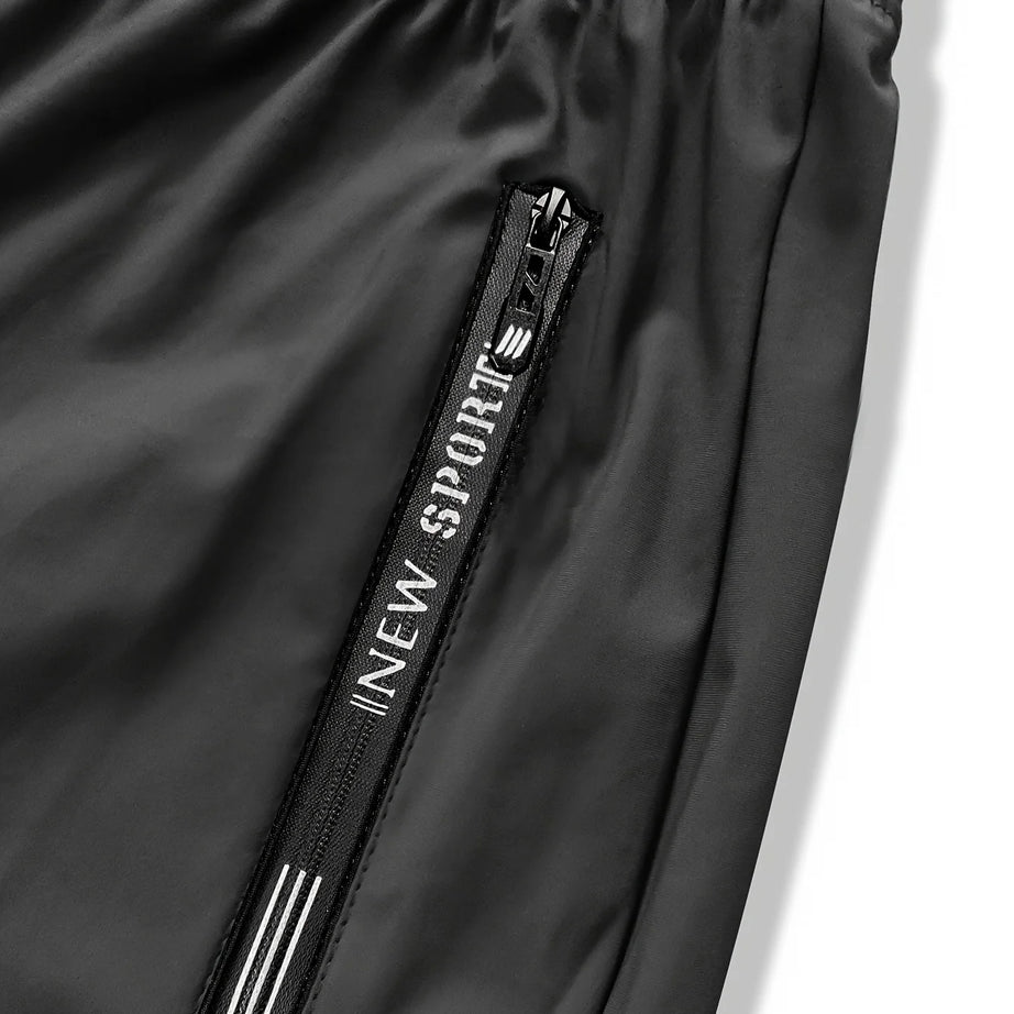 Pantalon de jogging homme, idéal pour la pêche. Modèle en soie glacée extensible avec poches zippées. Pantalon de sport respirant et élastique. Idée cadeau pour homme.
