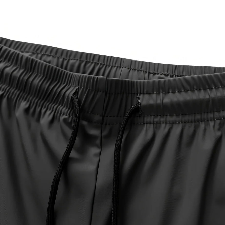 Pantalon de jogging homme, idéal pour la pêche. Modèle en soie glacée extensible avec poches zippées. Pantalon de sport respirant et élastique. Idée cadeau pour homme.
