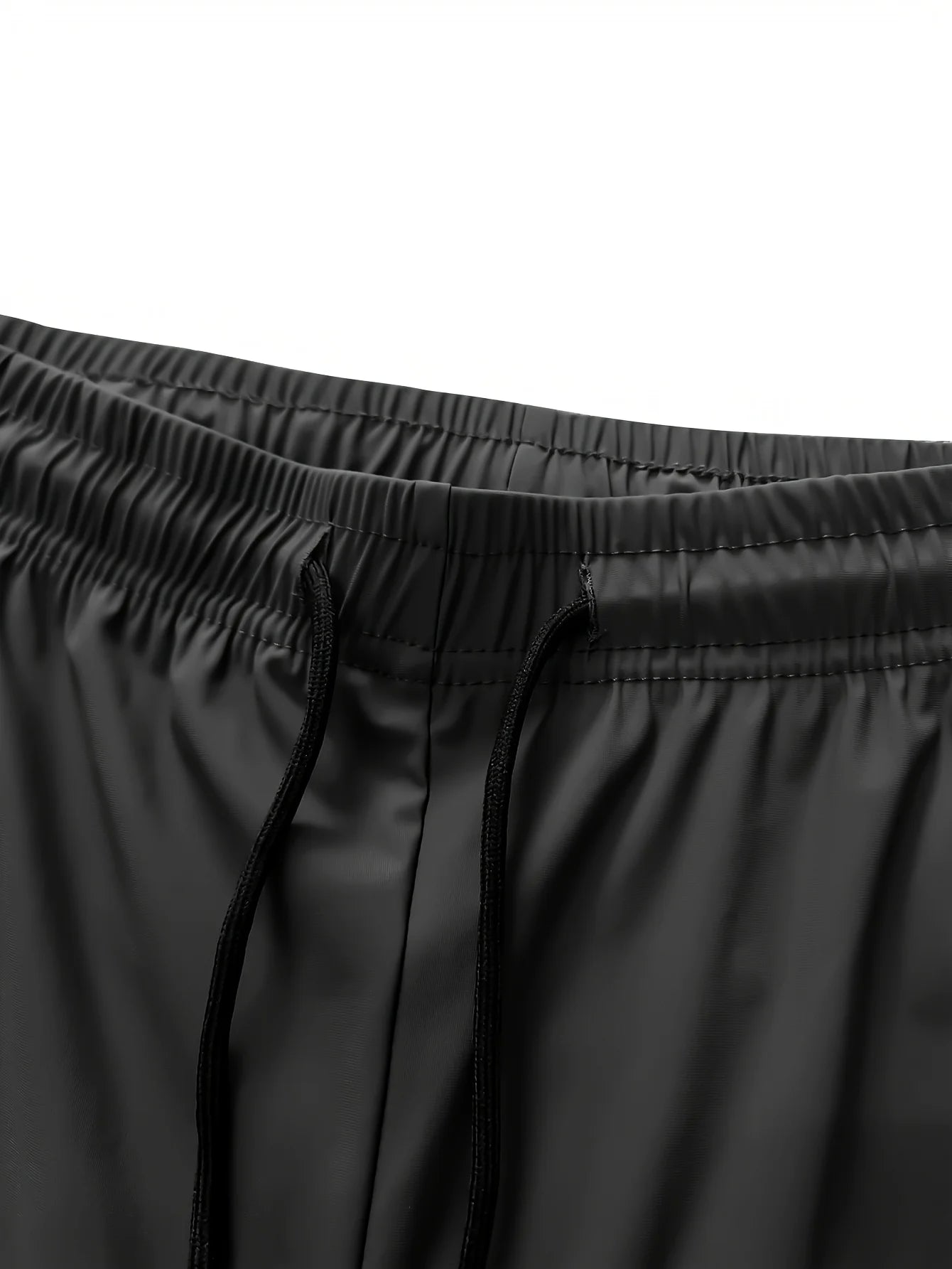 Pantalon de jogging homme, idéal pour la pêche. Modèle en soie glacée extensible avec poches zippées. Pantalon de sport respirant et élastique. Idée cadeau pour homme.