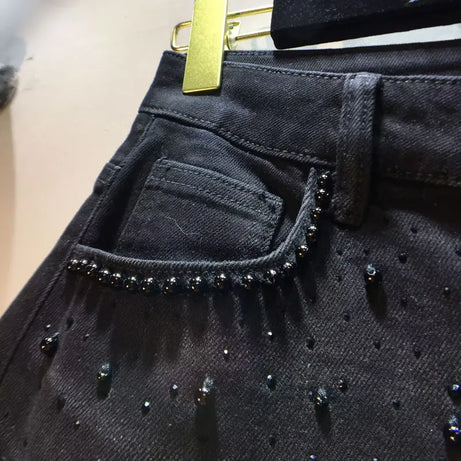 Jean en dentelle ajourée européenne 2025 pour femme, été, nouveau pantalon en denim noir à dentelle, perles industrielles lourdes, empiècements en denim à motif diamant, crochet