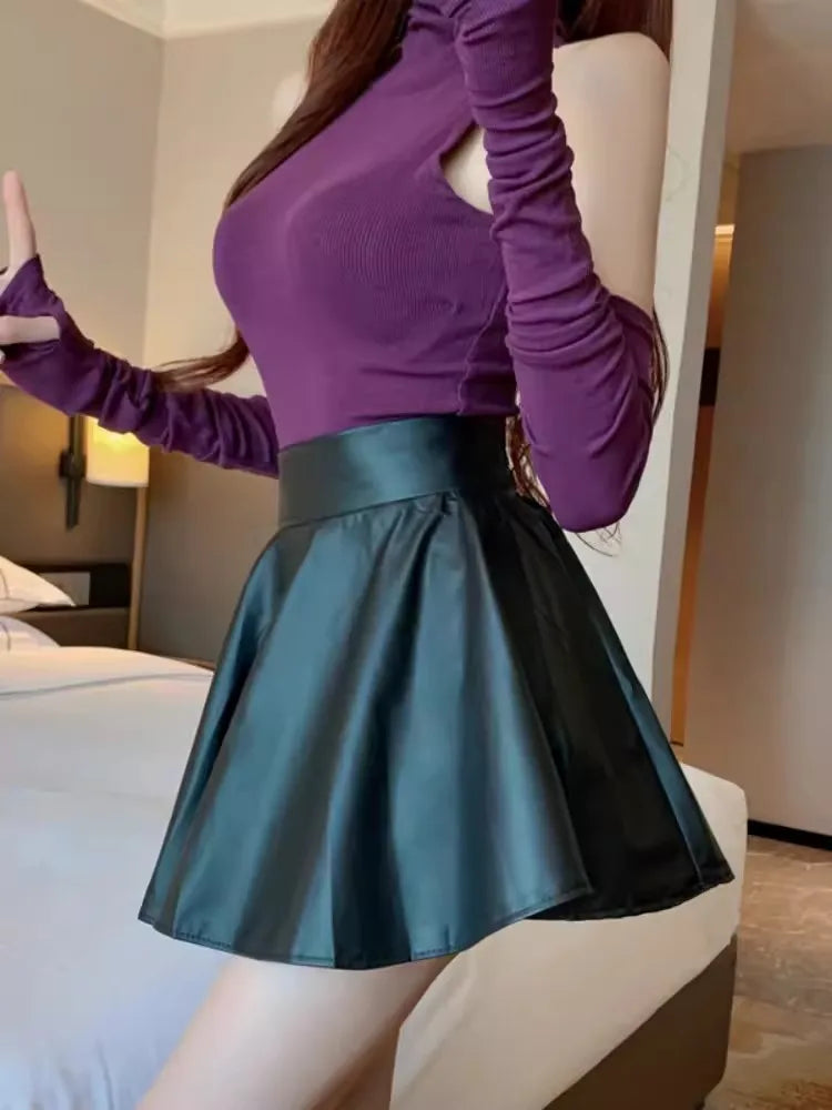 Jupe courte élastique polyvalente pour femme, en similicuir, taille haute, idéale pour le patinage, le travail et les soirées. Parfaite pour le travail et les sorties en boîte de nuit.