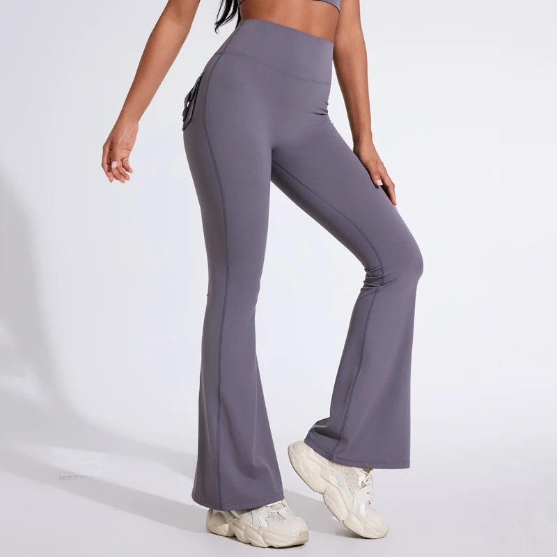 Pantalon de yoga taille haute à poches pour femme DIAS FIT JOY, effet push-up, séchage rapide, idéal pour la course, le sport et la salle de gym.
