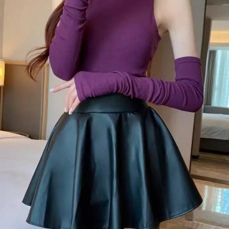 Jupe courte élastique polyvalente pour femme, en similicuir, taille haute, idéale pour le patinage, le travail et les soirées. Parfaite pour le travail et les sorties en boîte de nuit.