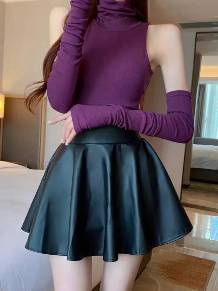 Jupe courte élastique polyvalente pour femme, en similicuir, taille haute, idéale pour le patinage, le travail et les soirées. Parfaite pour le travail et les sorties en boîte de nuit.