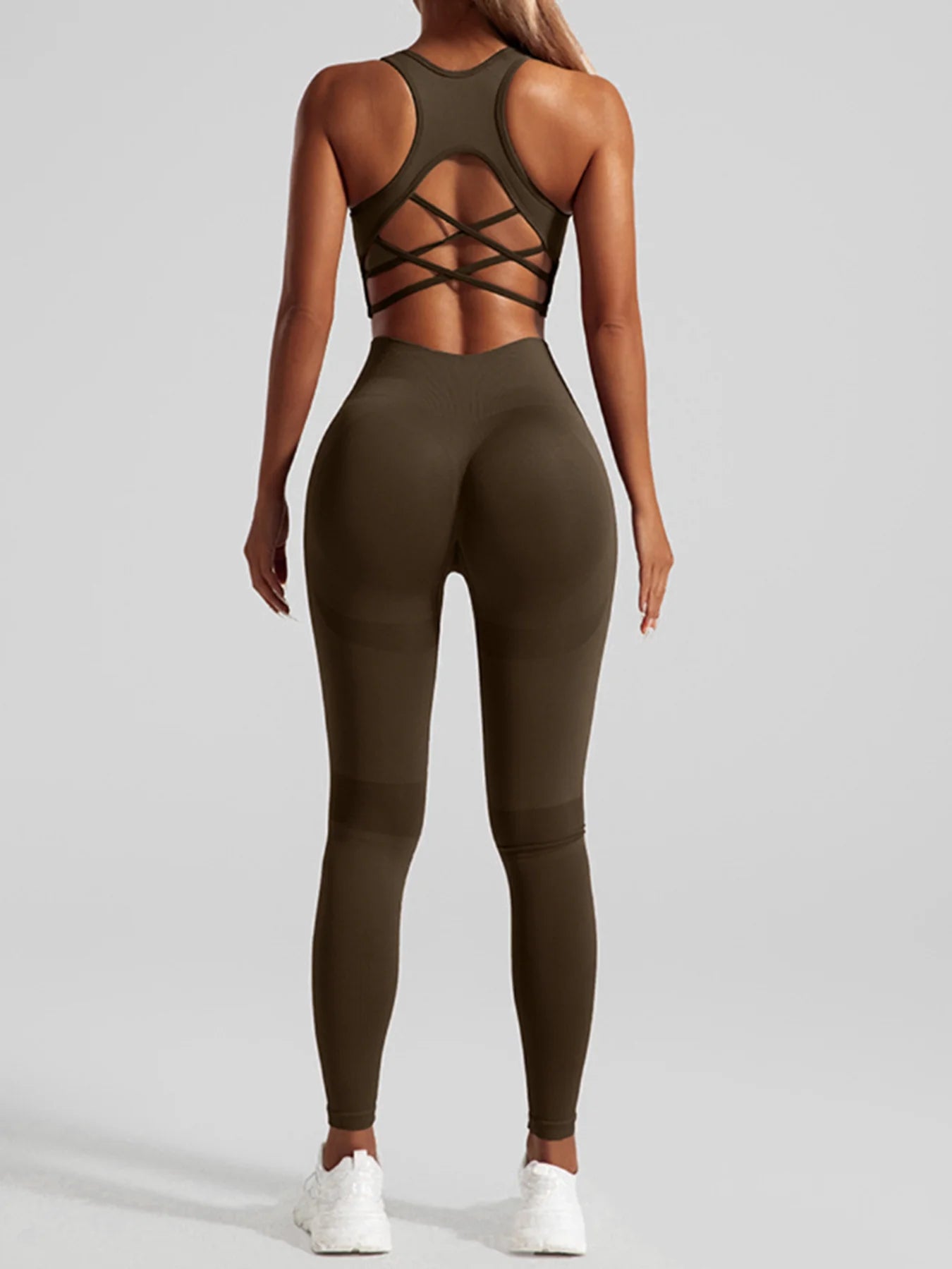 Ensemble de sport sans coutures pour femme : pantalon de yoga taille haute et brassière de sport avec coussinets amovibles pour un effet push-up fessier, idéal pour la course et l'entraînement.