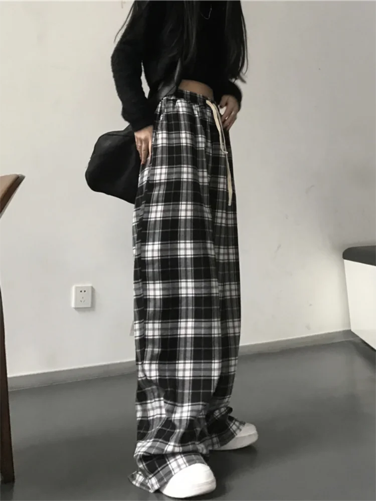 Pantalon de survêtement oversize pour femme, style tendance, à carreaux noirs, coupe ample, taille élastique, poches, style hip-hop unisexe, coupe ample.