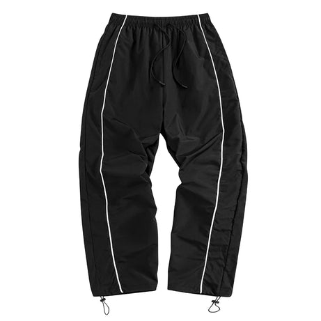 Pantalon de sport tendance pour homme, avec lignes, idéal pour la salle de sport et la course à pied. Poches latérales, séchage rapide et respirant.