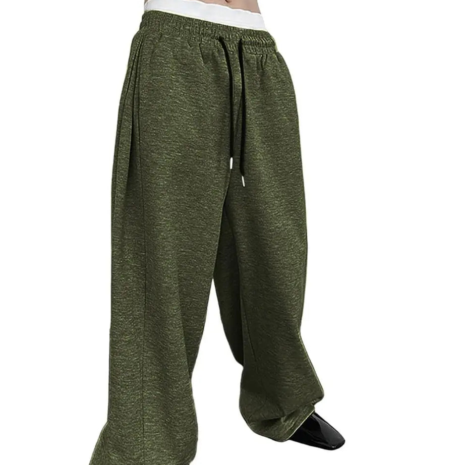 Pantalon de jogging pour homme, coupe droite, idéal pour le sport et la mode urbaine. Pantalon ample et décontracté avec cordon de serrage et plusieurs poches.