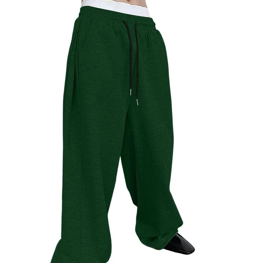 Pantalon de jogging pour homme, coupe droite, idéal pour le sport et la mode urbaine. Pantalon ample et décontracté avec cordon de serrage et plusieurs poches.