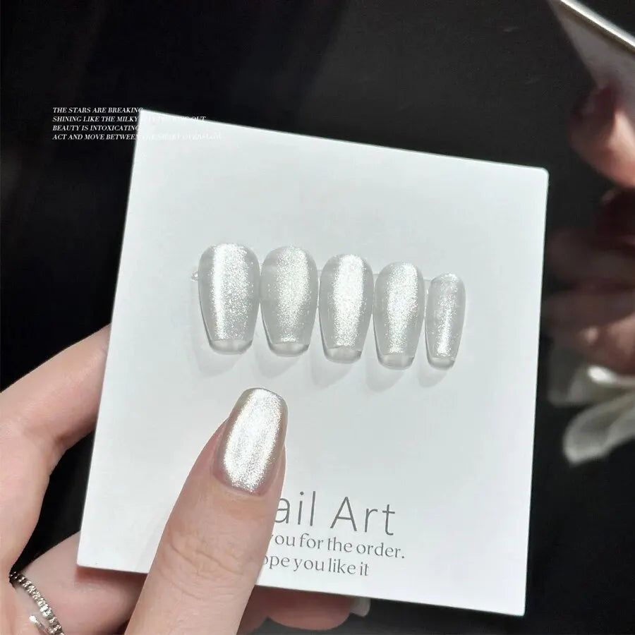 Vernis à ongles gel holographique à paillettes effet miroir blanc porcelaine, effet œil de chat, 10 ml, effet galactique magnétique, à dissoudre sous une lampe UV LED.