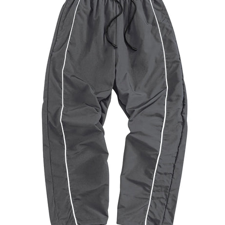 Pantalon de sport tendance pour homme, avec lignes, idéal pour la salle de sport et la course à pied. Poches latérales, séchage rapide et respirant.