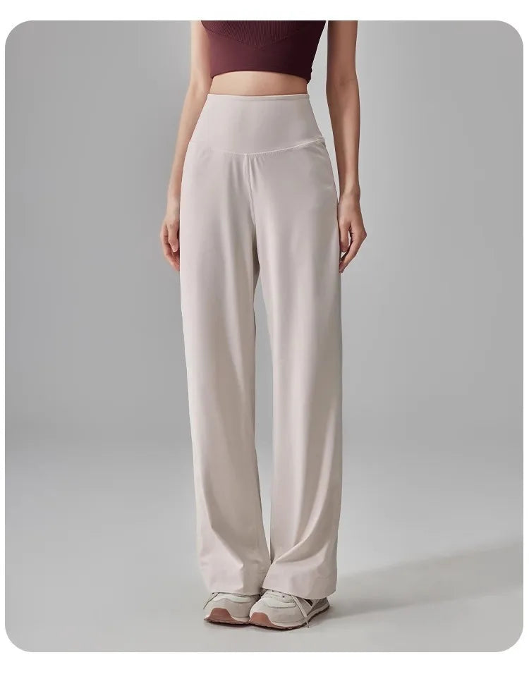 Pantalon de sport pour femme de haute qualité avec poches, taille haute, extensible et ample, effet seconde peau, idéal pour le sport, les loisirs et le yoga.