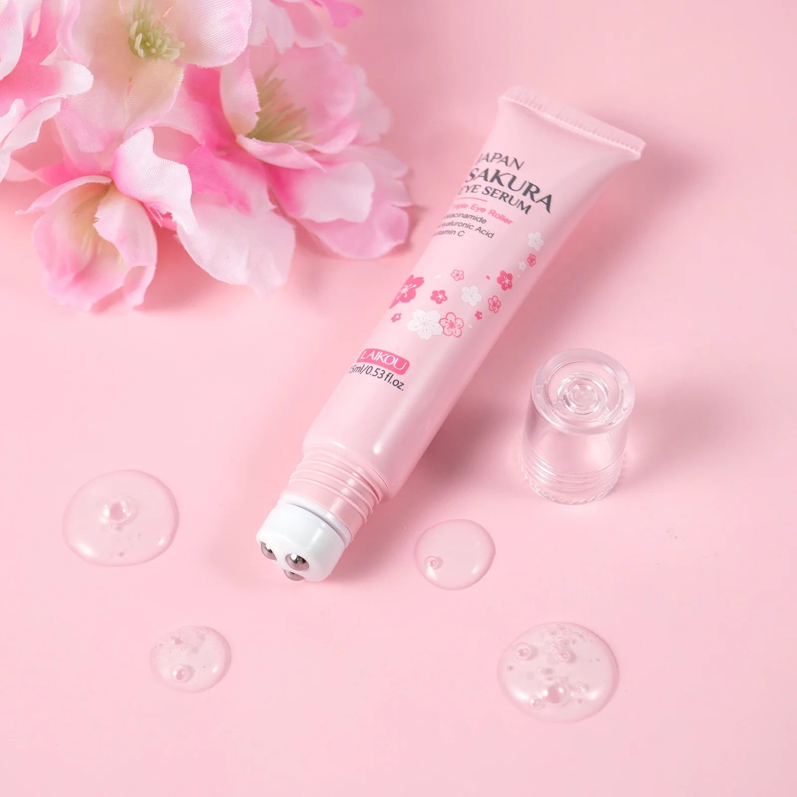 LAIKOU Sakura Eye Serum Roller Massage con ácido hialurónico para el cuidado de la piel, bolsas en los ojos, crema hidratante para ojeras 15 ml
