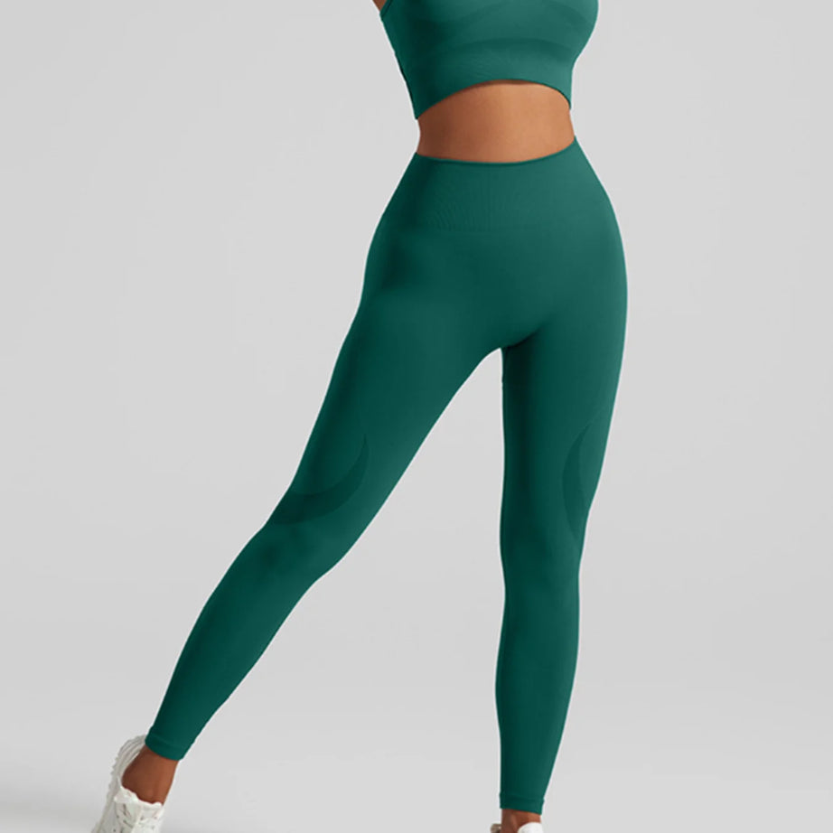 Ensemble de sport sans coutures pour femme : pantalon de yoga taille haute et brassière de sport avec coussinets amovibles pour un effet push-up fessier, idéal pour la course et l'entraînement.