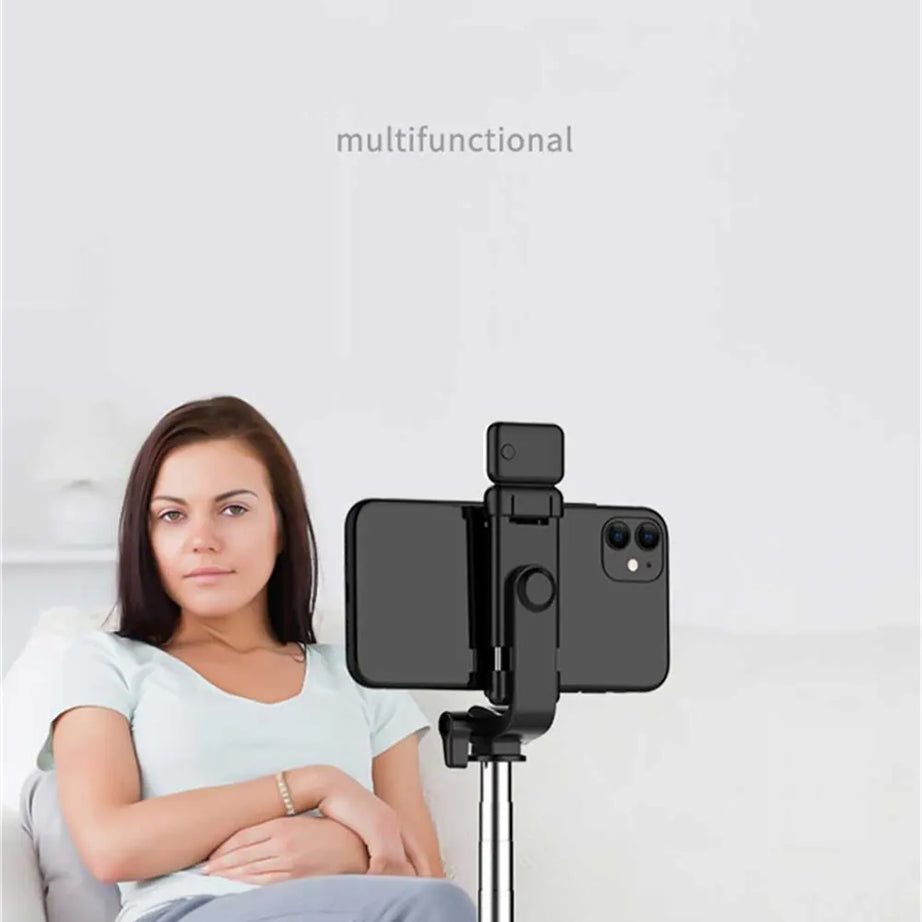 Perche à selfie sans fil avec support de téléphone, mini trépied multifonctionnel rétractable de 74 cm, lampe selfie LED et déclencheur à distance Bluetooth.