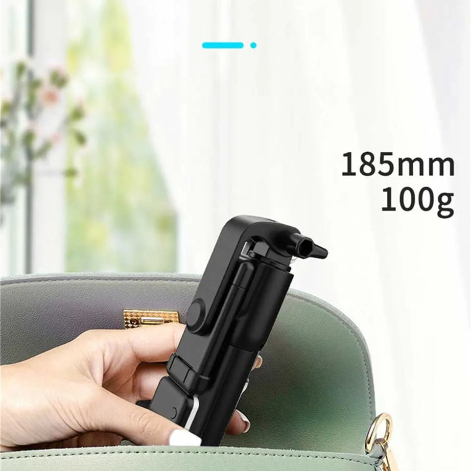 Perche à selfie sans fil avec support de téléphone, mini trépied multifonctionnel rétractable de 74 cm, lampe selfie LED et déclencheur à distance Bluetooth.