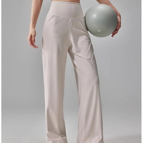 Pantalon de sport pour femme de haute qualité avec poches, taille haute, extensible et ample, effet seconde peau, idéal pour le sport, les loisirs et le yoga.