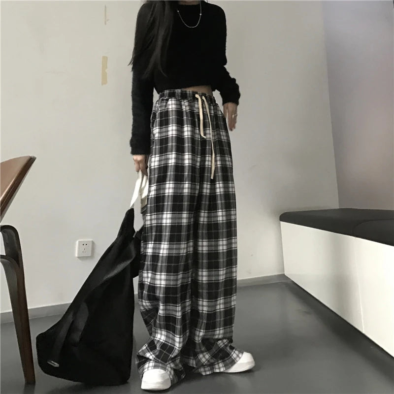 Pantalon de survêtement oversize pour femme, style tendance, à carreaux noirs, coupe ample, taille élastique, poches, style hip-hop unisexe, coupe ample.