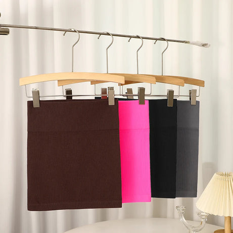 FINETOO Printemps Été Nouvelle Jupe Mini Taille Haute Élastique Noire Affinante en Tricot Court pour Femmes Professionnelles
