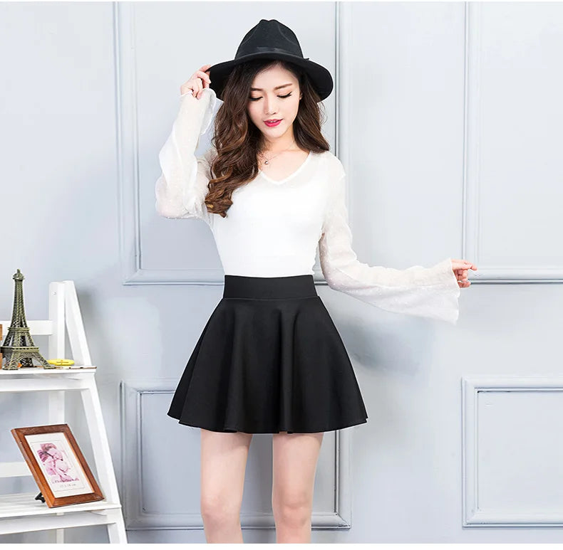Nouvelle jupe plissée coréenne taille haute, fine et élastique, noire.
