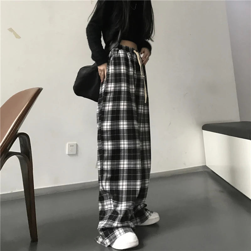 Pantalon de survêtement oversize pour femme, style tendance, à carreaux noirs, coupe ample, taille élastique, poches, style hip-hop unisexe, coupe ample.