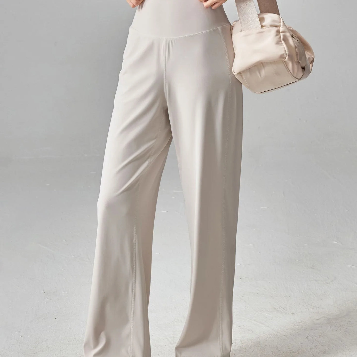 Pantalon de sport pour femme de haute qualité avec poches, taille haute, extensible et ample, effet seconde peau, idéal pour le sport, les loisirs et le yoga.